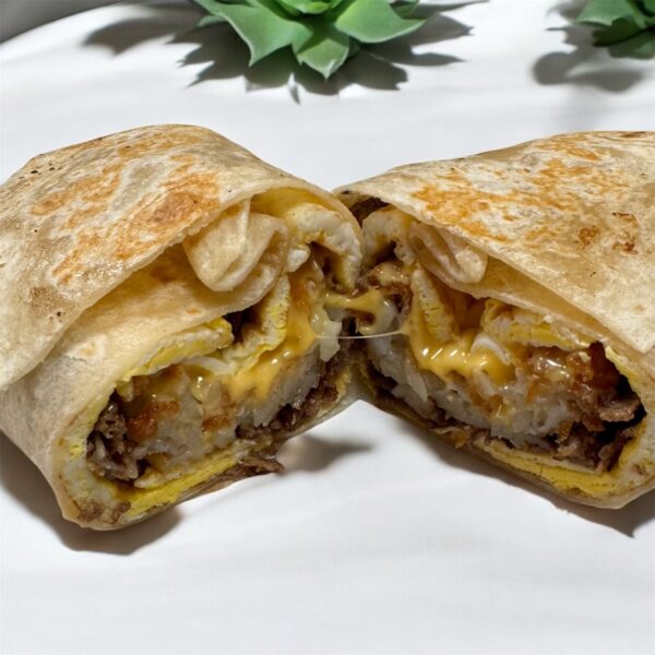 Steak & Eggs Burrito with cheese & a Hash Brown Steak & Egg